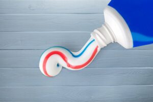 A squeezed tube of toothpaste.