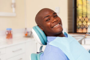 Dental patient smiling in the dental chair