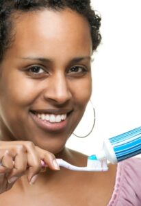 woman protecting her gums