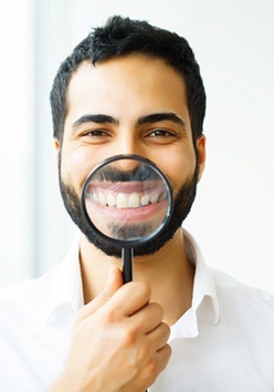 Man showing off new smile because of Cosmetic teeth bonding