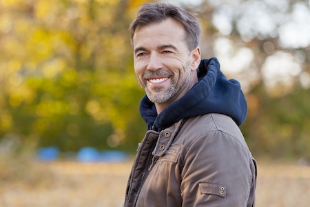 Man smiling because of implants in Marble Falls near Brady, TX